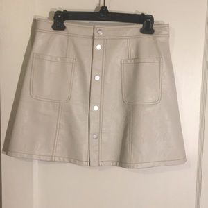 River Island cream pleather snap front mini skirt